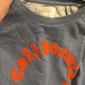 Lucky Brand Women’s   Blue Sweatshirt with Orange 'California Daisy' Appliqué
